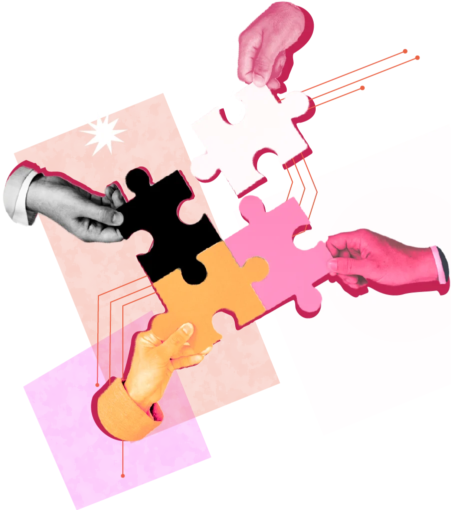 Four hands of different skin tones bring together colorful jigsaw puzzle pieces in pink, orange, yellow, and black.